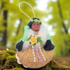 Handcrafted Native American Seashell Doll Ornament with Floral Details